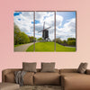 Traditional wooden old windmill in Bruges, Belgium multi panel canvas wall art