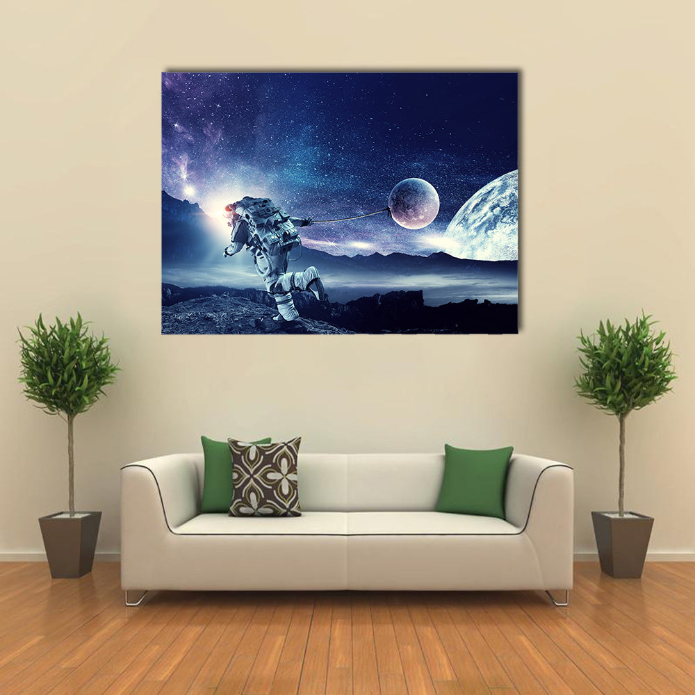 Astronaut Landing On Space Pulling Planet On Rope Multi Panel Canvas Wall Art Print Set