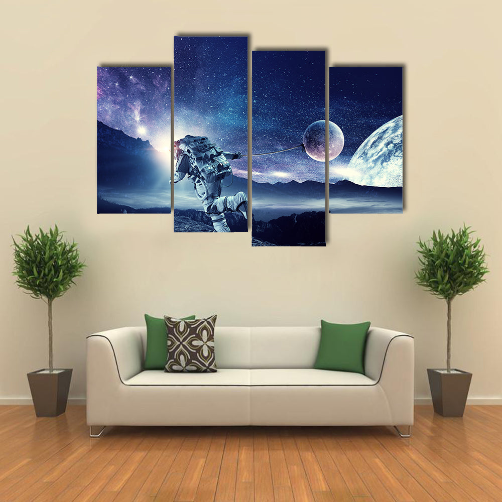 Astronaut Landing On Space Pulling Planet On Rope Multi Panel Canvas Wall Art Print Set