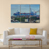 Cargo ship at container handling gantry crane Multi panel canvas wall art