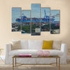 Cargo ship at container handling gantry crane Multi panel canvas wall art