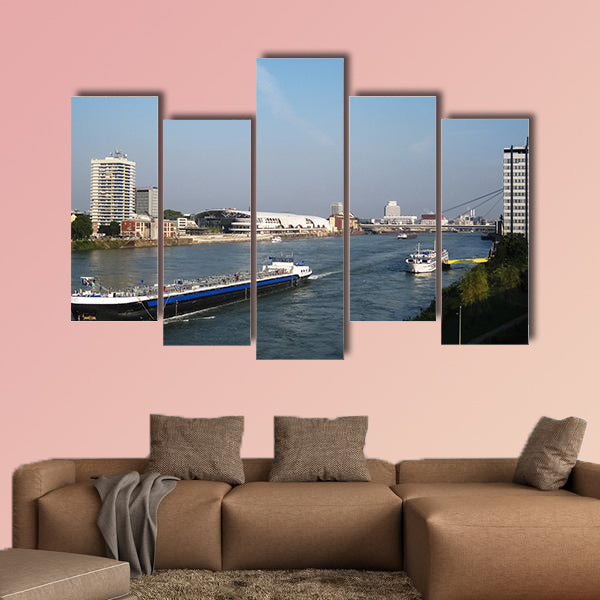  Black cargo ship passing and white cruise ship in Germany wall art