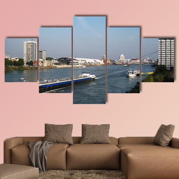  Black cargo ship passing and white cruise ship in Germany wall art