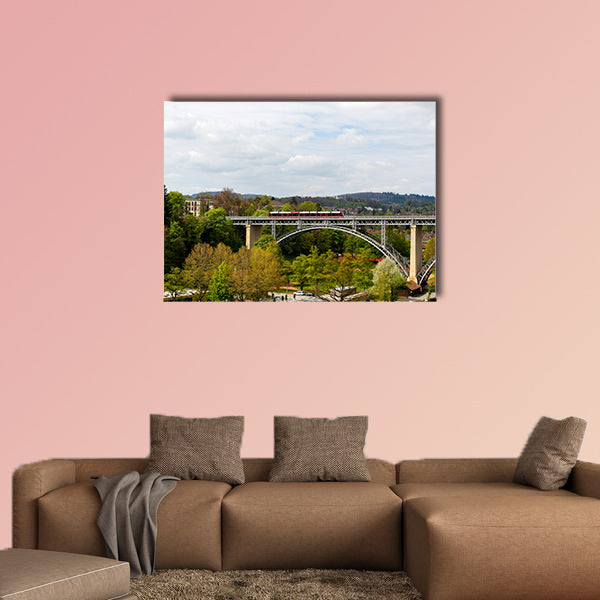 The high arched steel bridge on which the tram goes multi panel canvas wall art
