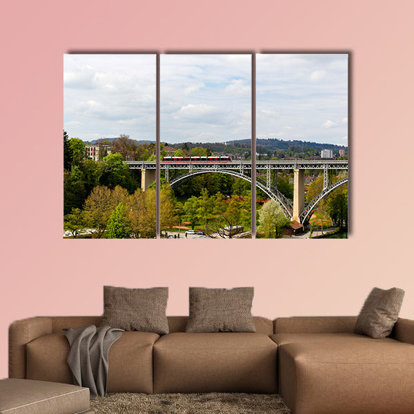 The high arched steel bridge on which the tram goes multi panel canvas wall art