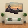 Red sunset over the rain forest Multi Panel Canvas Wall Art