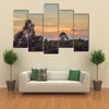 Red sunset over the rain forest Multi Panel Canvas Wall Art