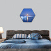 Icebergs floating in the moonlight hexagonal canvas wall art