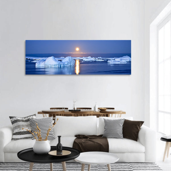 Antarctica icebergs floating in the moonlight Panoramic Canvas Wall Art