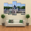 Building in Budapest with its Reflection in the water Multi Panel Canvas Wall Art