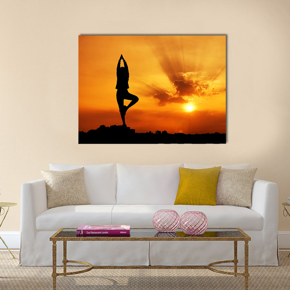 Silhouette of a beautiful Yoga woman in the morning Multi panel canvas wall art