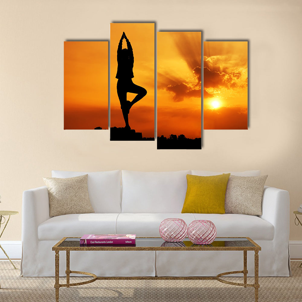 Silhouette of a beautiful Yoga woman in the morning Multi panel canvas wall art