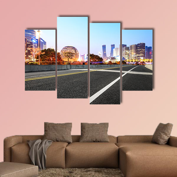 Asphalt highway and modern city buildings multi panel canvas wall art