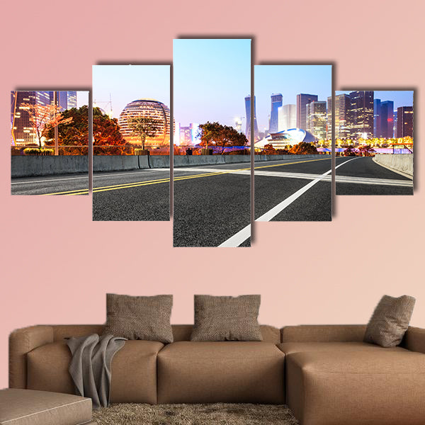 Asphalt highway and modern city buildings multi panel canvas wall art