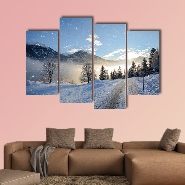 View of an icy road with snowfall and mountain range wall art