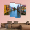 The evening shot of historic buildings in Bruges, Belgium multi panel canvas wall art