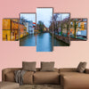 The evening shot of historic buildings in Bruges, Belgium multi panel canvas wall art