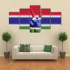 Gambia national flag painted onto a male hand Multi Panel Canvas Wall Art