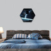 Dark asteroids flying close to planets hexagonal canvas wall art