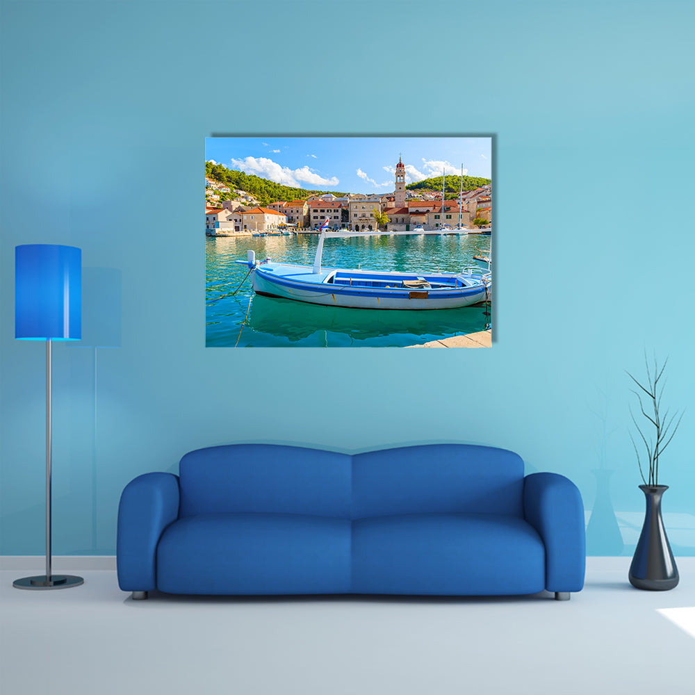 A Church In The Background And A Fishing Boat In Front Multi Panel Canvas Wall Art