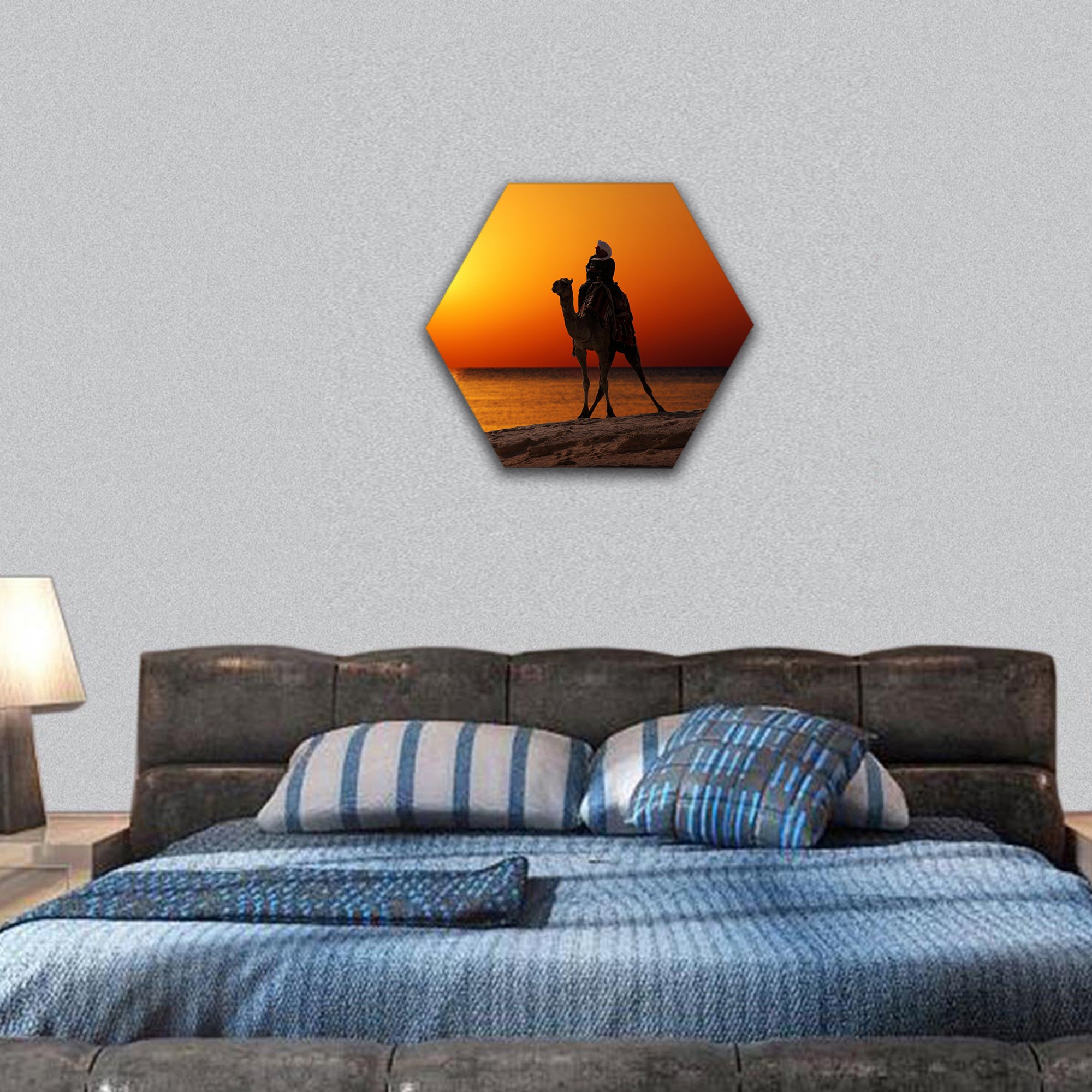 bedouin on camel silhouette against sunrise over sea hexagonal canvas wall art