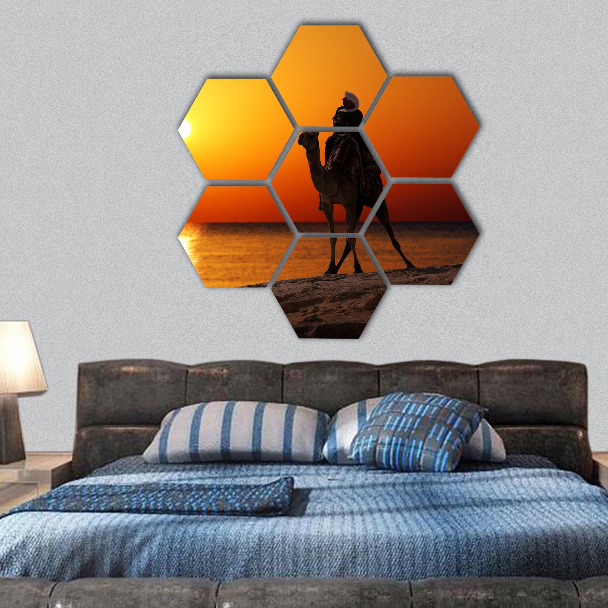 bedouin on camel silhouette against sunrise over sea hexagonal canvas wall art