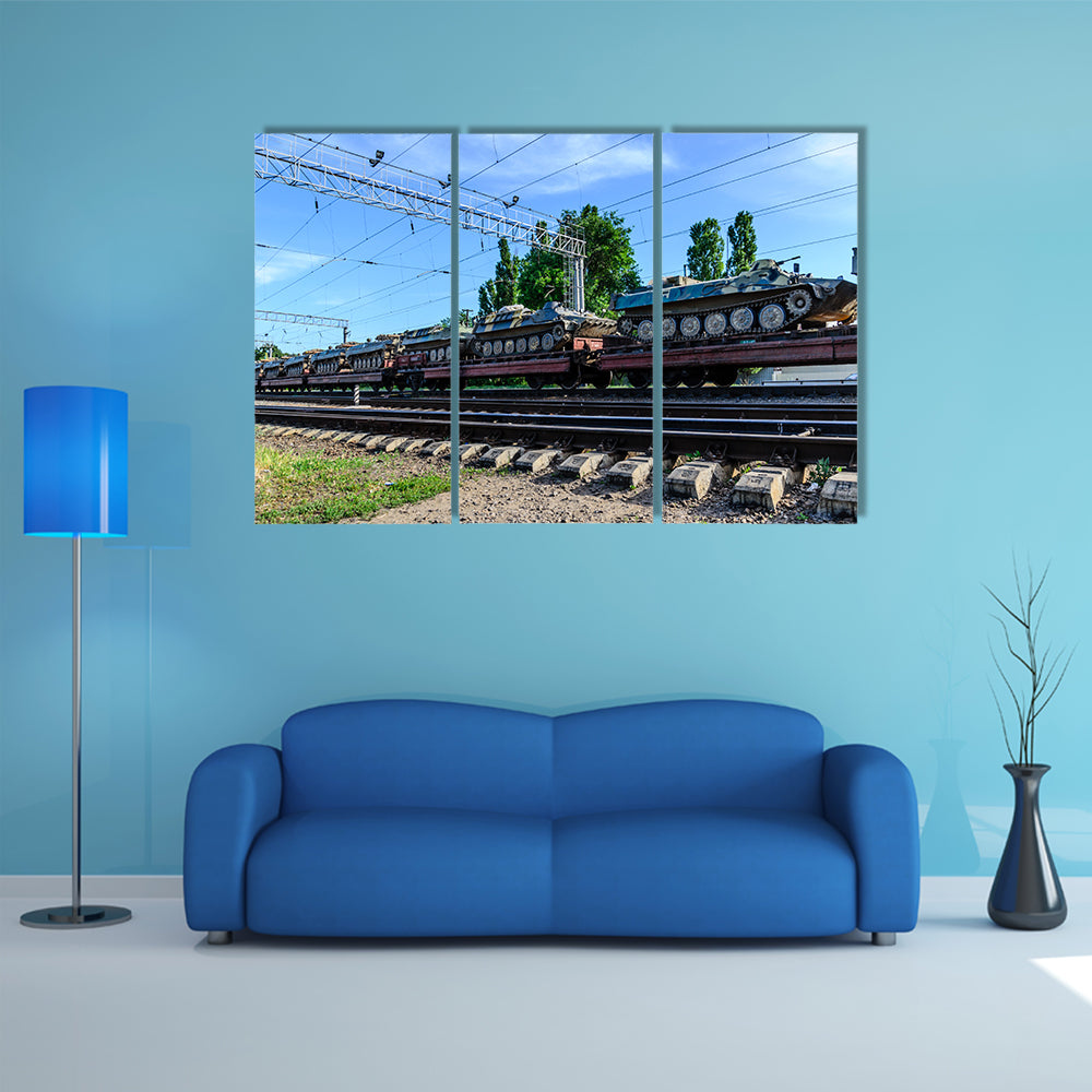 A Cargo Train That Is Carrying Many Tanks Multi Panel Canvas Wall Art
