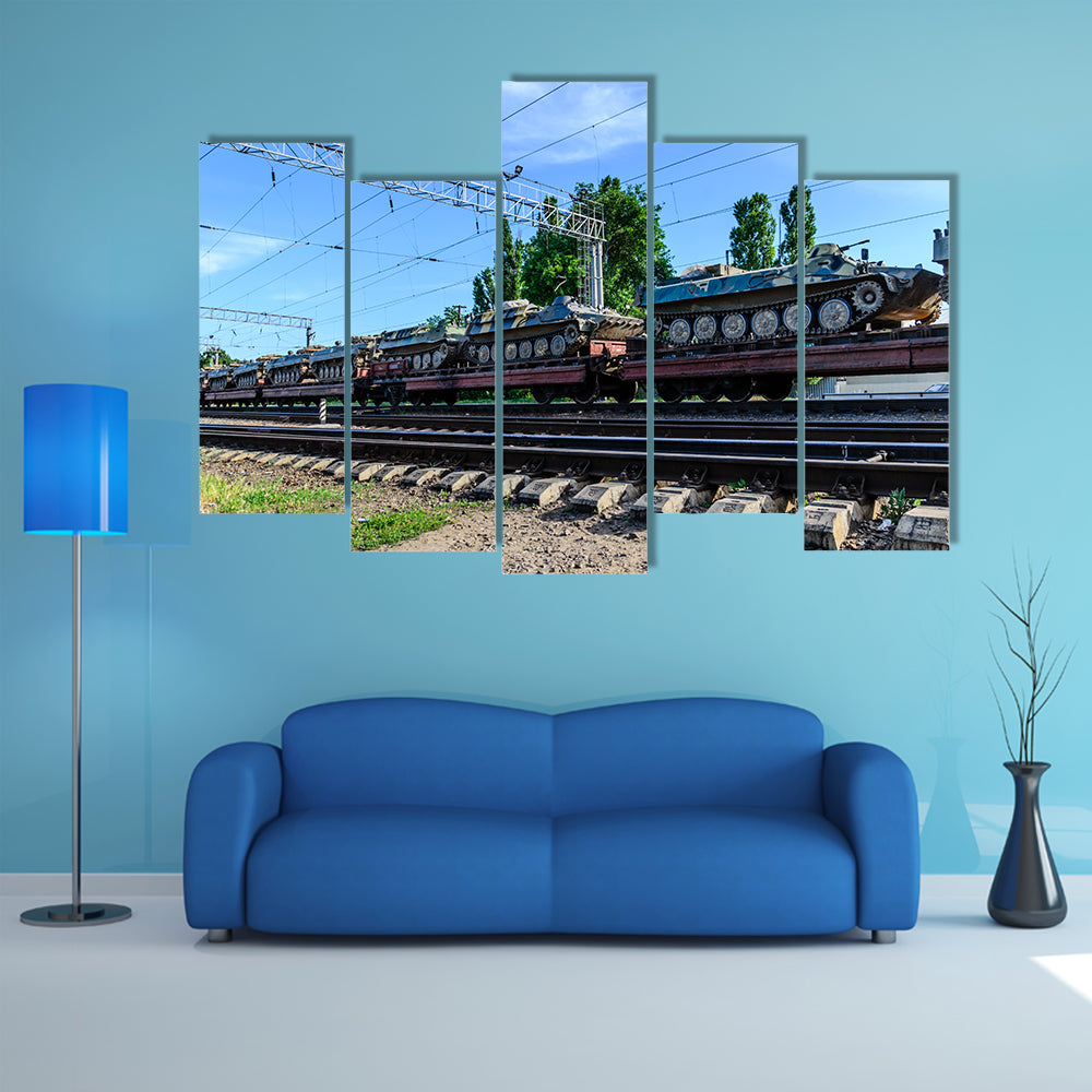 A Cargo Train That Is Carrying Many Tanks Multi Panel Canvas Wall Art