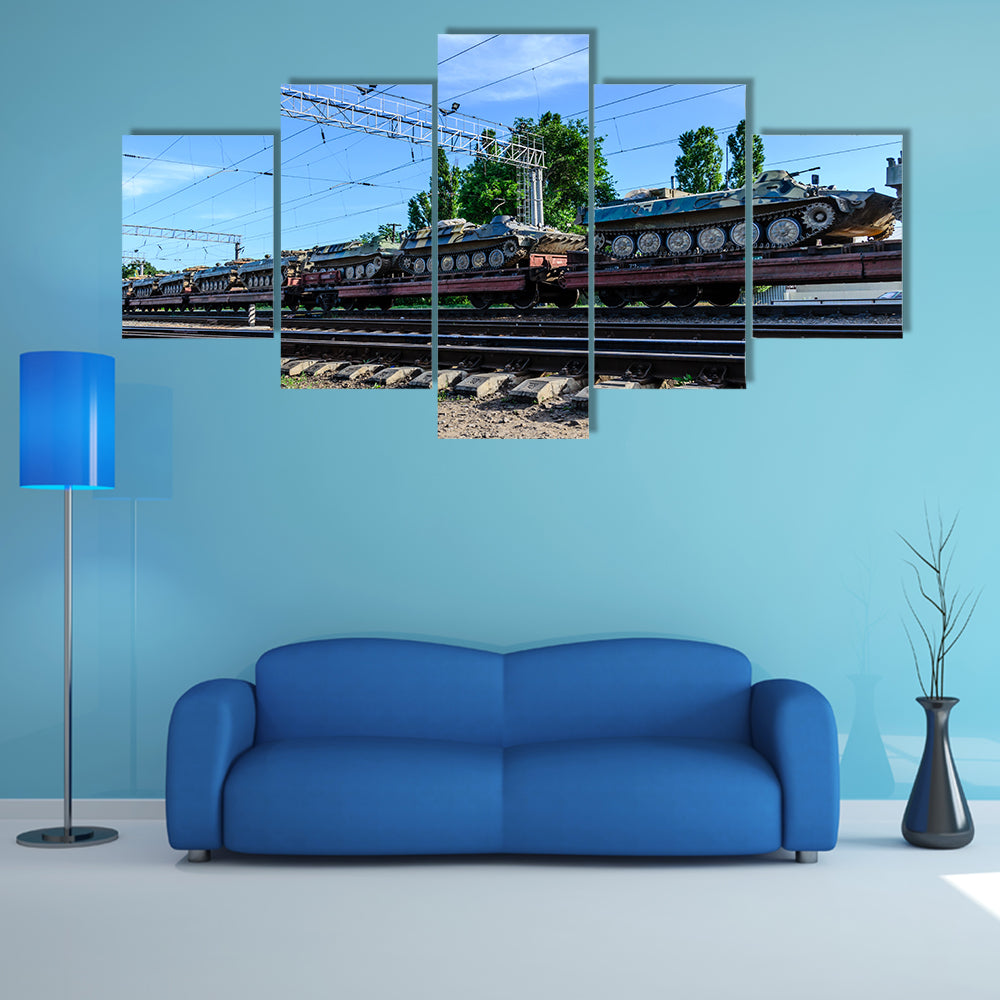 A Cargo Train That Is Carrying Many Tanks Multi Panel Canvas Wall Art