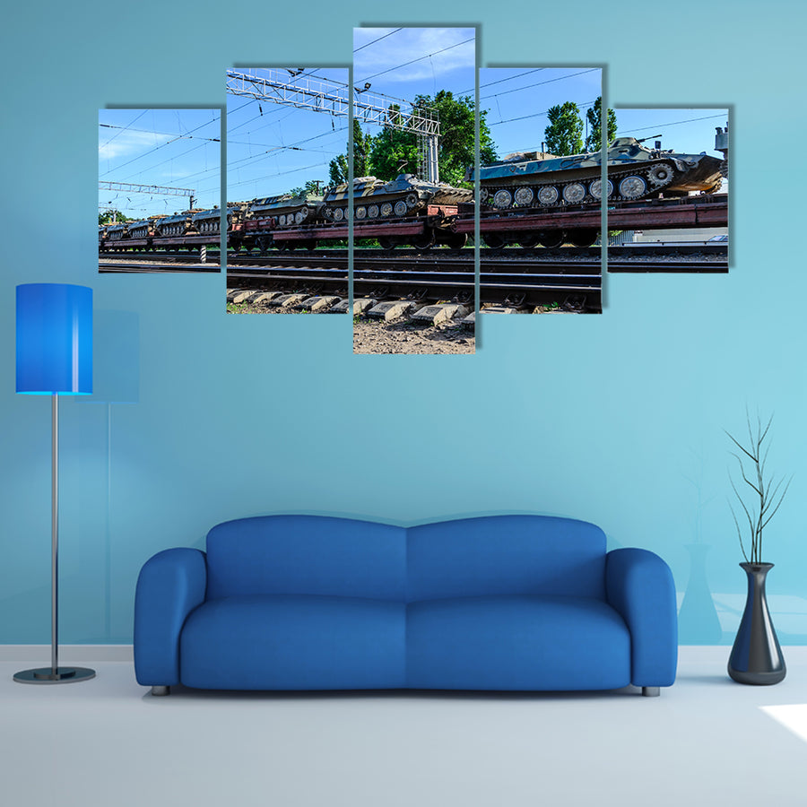 A Cargo Train That Is Carrying Many Tanks Multi Panel Canvas Wall Art