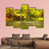 Beautiful autumn forest with Mountain River and colorful trees multi panel canvas wall art