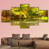 Beautiful autumn forest with Mountain River and colorful trees multi panel canvas wall art