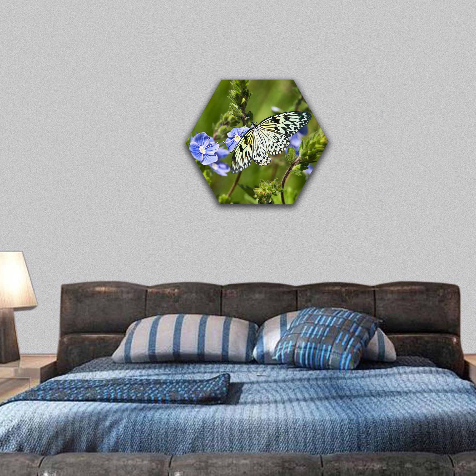 Butterfly on blue flowers closeup on meadows hexagonal canvas wall art