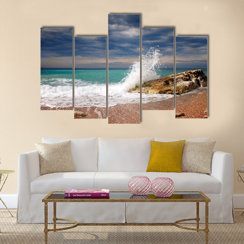 Wave crash on the stone Multi Panel Canvas Wall Art