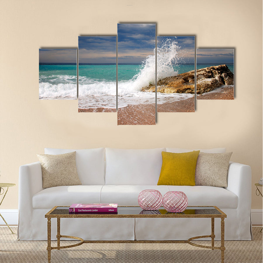 Wave crash on the stone Multi Panel Canvas Wall Art