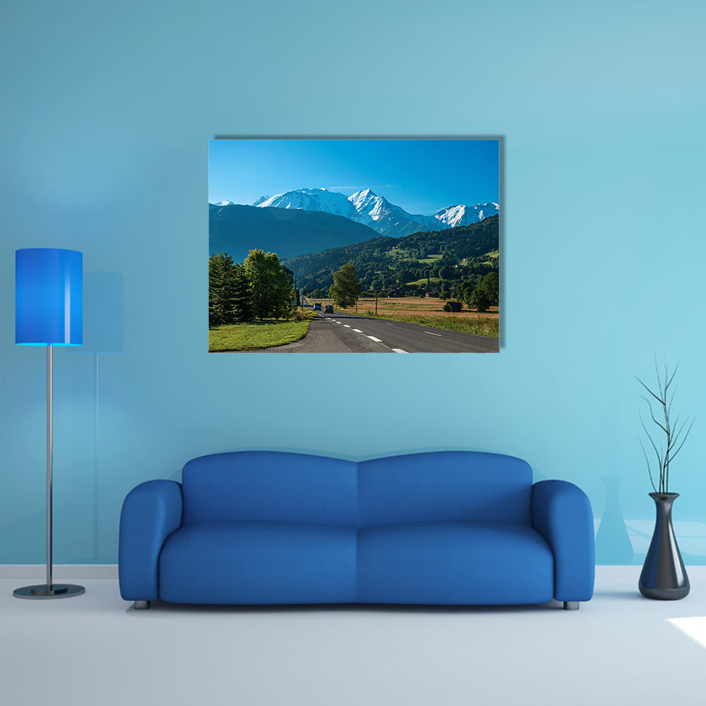 Road between fields, green forest and alpine landscape in a sunny day, multi panel canvas wall art