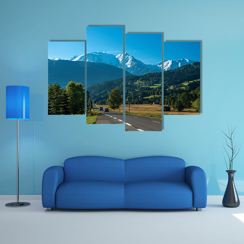 Road between fields, green forest and alpine landscape in a sunny day, multi panel canvas wall art