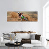 Motocross rider with a strong slope turns on  sandy track Panoramic Canvas Wall Art