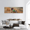 Motocross rider with a strong slope turns on  sandy track Panoramic Canvas Wall Art