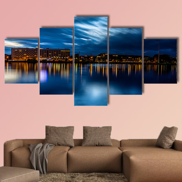 Riga skyline Night shot with scenic water reflections in Daugava River wall art