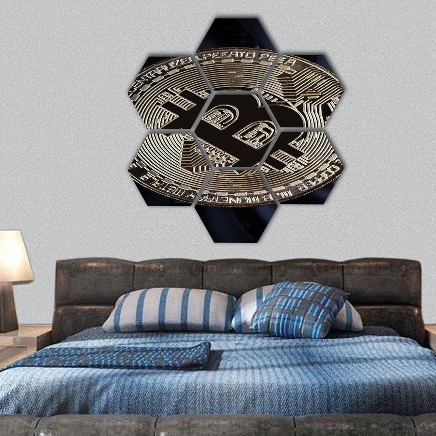 one golden bitcoin on top of a computer hexagonal canvas wall art