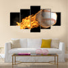 A base ball thats on fire flying through the air Multi panel canvas wall art