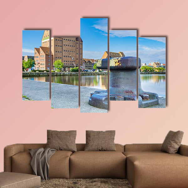 Building in the city harbor of Rostock multi panel canvas wall art