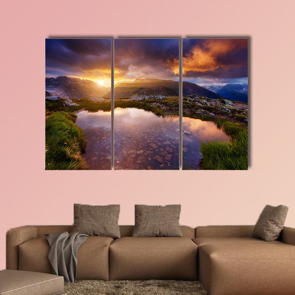 Magnificent views of mountain slopes in the sunbeams multi panel canvas wall art