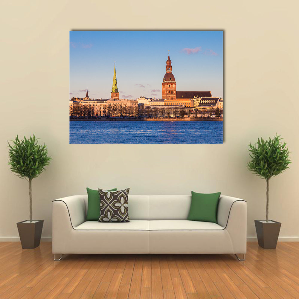 Riga Cathedrals, St. Peters Church Over The Bank Of River Riga, Latvia Multi Panel Canvas Wall Art