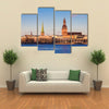 Riga Cathedrals, St. Peters Church Over The Bank Of River Riga, Latvia Multi Panel Canvas Wall Art