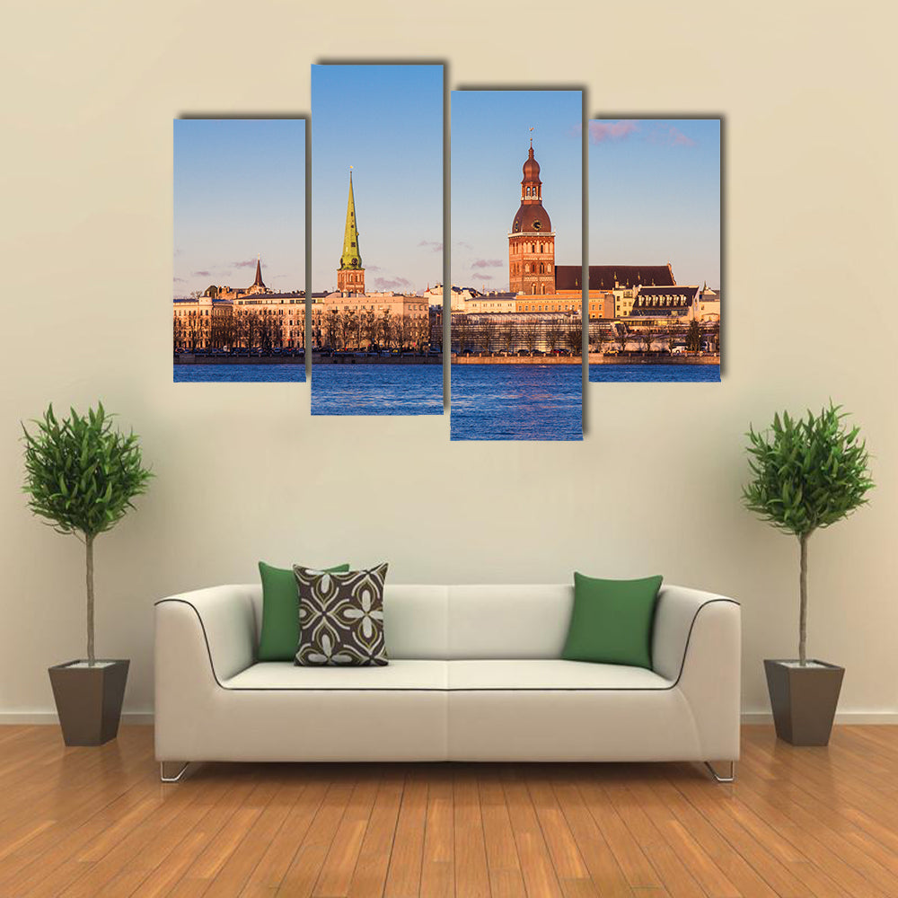 Riga Cathedrals, St. Peters Church Over The Bank Of River Riga, Latvia Multi Panel Canvas Wall Art