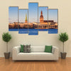 Riga Cathedrals, St. Peters Church Over The Bank Of River Riga, Latvia Multi Panel Canvas Wall Art