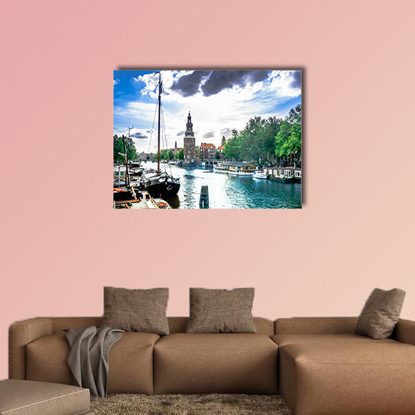 View on canal and traditional buildings in Amsterdam multi panel canvas wall art