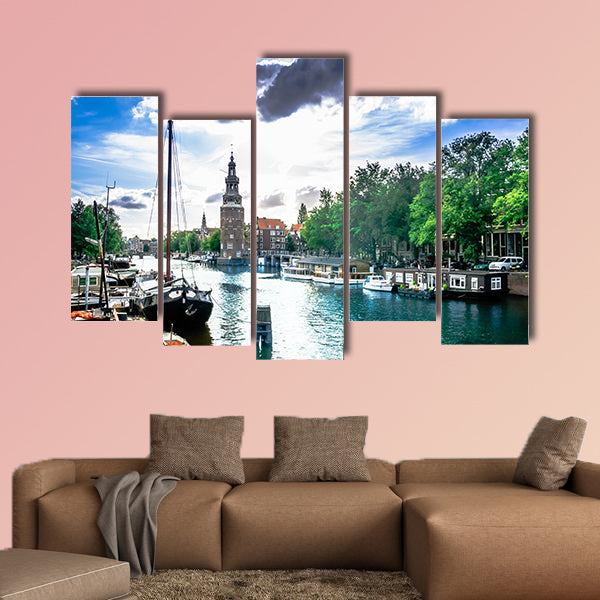 View on canal and traditional buildings in Amsterdam multi panel canvas wall art